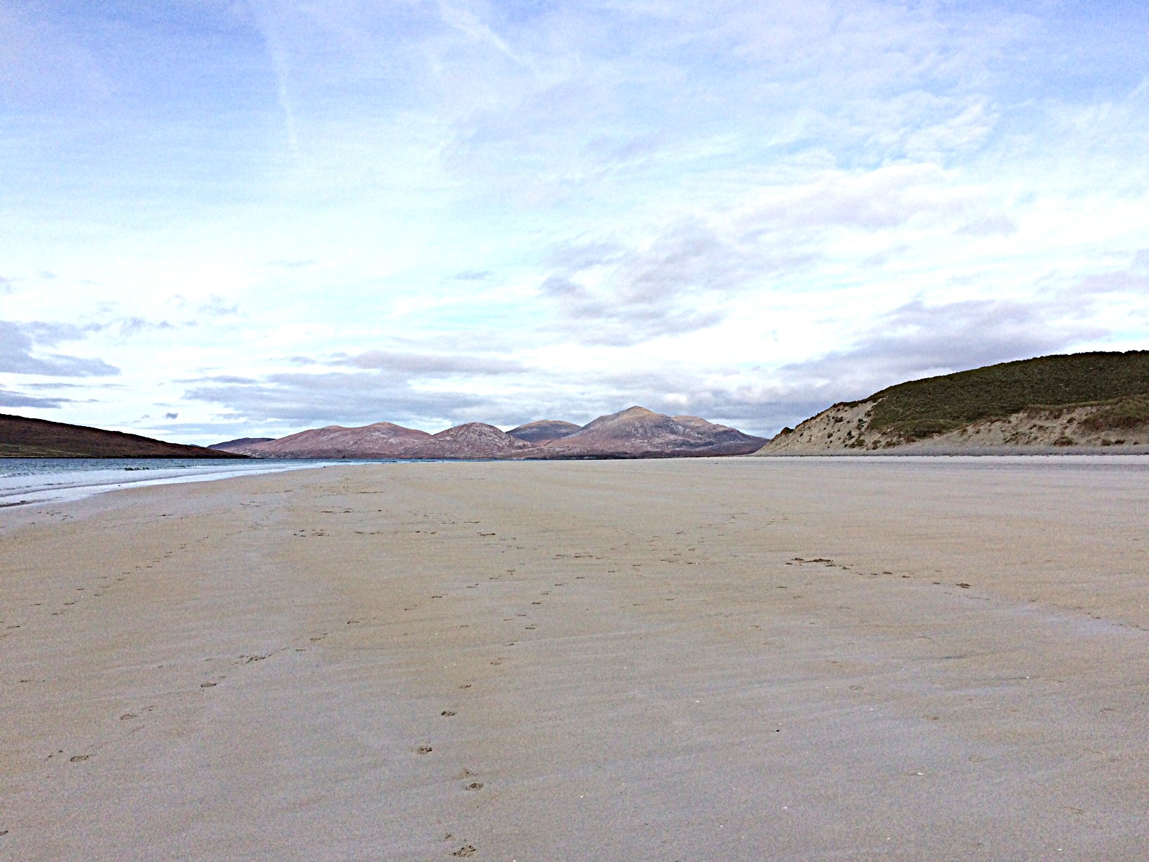Luskentyre beach - calming, grounding photo incorporating elements of nature a and energy - sand, sea, hills, clouds